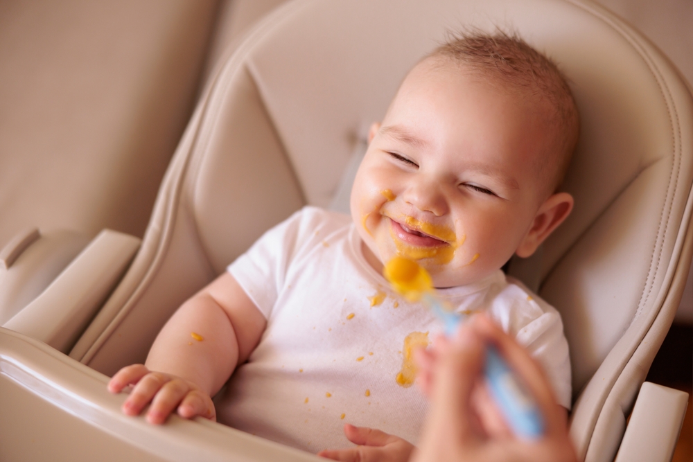 Baby eating solid food