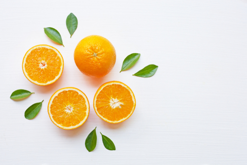 Fresh,orange,citrus,fruit,with,leaves,isolated,on,white,background.